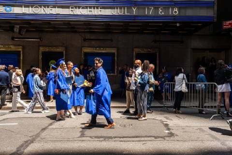 Fashion Institute of Technology commencement in New York Very recent graduates from the Fashion Institute of Technology with their friends and families outside of Radio City Music Hall in New York on Wednesday, May 22, 2019 after the college s commencement exercises. (  RichardxB.xLevine