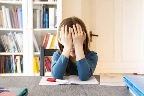 Frustrated girl with homework model released Symbolfoto property released  LVF07944