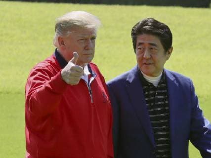 Trump in Japan Japanese Prime Minister Shinzo Abe (R) and U.S. President Donald Trump are pictured at Mobara Country Club in Chiba Prefecture on May 26, 2019, after Trump s arrival aboard the Marine One helicopter. Abe and Trump played golf at the course near Tokyo -- their fifth round together since the U.S. leader took office in 2017. (Pool photo) 