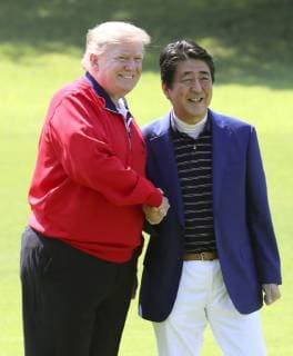 Trump in Japan U.S. President Donald Trump (L) and Japanese Prime Minister Shinzo Abe shake hands after Trump s arrival at Mobara Country Club in Chiba Prefecture, near Tokyo, on May 26, 2019. The two leaders played their fifth round of golf together since Trump took office in 2017. (Pool photo) 