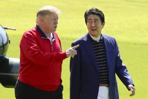 Trump in Japan U.S. President Donald Trump (L) and Japanese Prime Minister Shinzo Abe chat after Trump s arrival at Mobara Country Club in Chiba Prefecture, near Tokyo, on May 26, 2019. The two leaders played their fifth round of golf together since Trump took office in 2017. (Pool photo) 