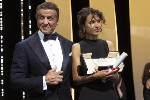 Mati Diop accepts the Grand Prize of the Festival for the movie Atlantique Atlantics from US actor Sylvester Stallone at the award ceremony during the 72nd Cannes Film Festival at the Palais des Festivals on May 25, 2019 in Cannes, France Foto:xR.xWagnerx xFuturexImage
