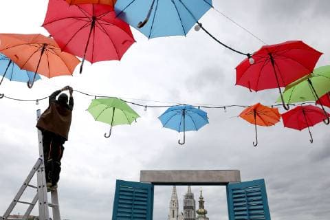 Coloured umbrellas at festival - Zagreb, Croatia 30.05.2019., Zagreb, Croatia - Hanging coroured umbrellas as a part of preparation for Bas Nas gourmet & music festival at upper town in Zagreb  PatrikxMacek PIXSELL