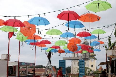 Coloured umbrellas at festival - Zagreb, Croatia 30.05.2019., Zagreb, Croatia - Hanging coroured umbrellas as a part of preparation for Bas Nas gourmet & music festival at upper town in Zagreb  PatrikxMacek PIXSELL