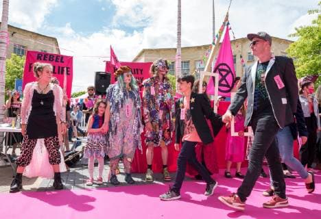 June 1, 2019 - Bristol, Bristol, UK - Bristol, UK. Extinction Rebellion s catwalk fashion show in Bristol s Broadmead shopping centre. Campaigners from Extinction Rebellion are carrying out a five-hour protest which will include everything from a ‘pop-upâ€⠢ catwalk to blocking the city centre traffic. The protest targets Bristolâ€⠢s fashion and clothes stores with people urged to not buy any new items of clothing for the next year. There will also be a ‘pop-up catwalkâ€⠢, where designers will be showing off their work to demonstrate the needed shift away from fast fashion towards a fairer, safer, cleaner, more transparent fashion industry. People are encouraged to repair, re-use, alter, upcycle and recycle clothes in a year-long boycott aiming to economically disrupt the fashion and textile industry demanding th - ZUMAl94_ 20190601_zaf_l94_053 Copyright: xSimonxChapmanx