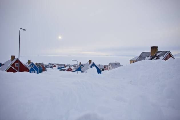GREENLAND Village of Ittoqqortoormiit after heavy snow fall. Scoresbysund, North East Greenland. February 2009.  1284293 UrixGolman