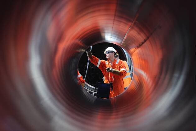 LENINGRAD REGION, RUSSIA - JUNE 5, 2019: A worker at the construction site of a section of the Nord Stream 2 natural gas pipeline near Kingisepp, Leningrad Region. Alexander Demianchuk TASS  TS0ADD7E