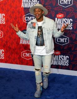 Artist Jimmie Allen arrives for the 2019 CMT Music Awards on June 5, 2019 at the Bridgestone Arena in Nashville, Tennessee.  NAS20190605168 JOHNxSOMMERSxII