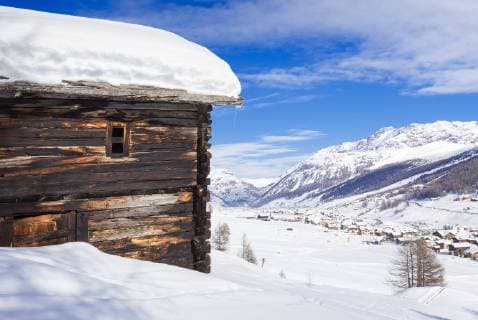 Tradiitional hut with view on the village, Livigno, Valtellina, Lombardy, Italy, Europe Copyright: FrancescoxBergamaschi 1269-458