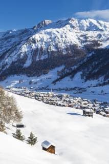 Village illuminated by sun after a snowfall, Livigno, Valtellina, Lombardy, Italy, Europe Copyright: FrancescoxBergamaschi 1269-462