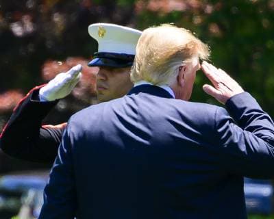 June 11, 2019 - Washington, District of Columbia, U.S. - United States President Donald J. Trump salutes the Marine Guard as he boards Marine One after taking questions from reporters as he prepares to depart the South Lawn of the White House in Washington, DC for a trip to Iowa. He will return this evening Washington U.S. - ZUMAs152 20190611_zaa_s152_039 Copyright: xRonxSachsx