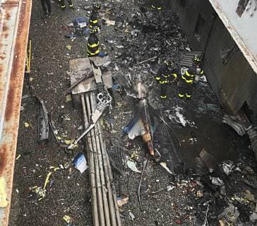 June 10, 2019, New York, New York, USA: New York City firefighters work at the scene of a helicopter crash on the roof of the Equitable Building in midtown Manhattan, New York USA  - ZUMA 20190612_new_z03_002 Copyright: xFDNYx