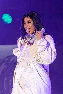 June 16, 2019 - Manchester, Tennessee, U.S - CARDI B changes into a bath robe to complete her performance during the Bonnaroo Music + Arts Festival in Manchester, Tennessee Manchester U.S. - ZUMAs135 20190616_zap_s135_029 Copyright: xDanielxDeSloverx