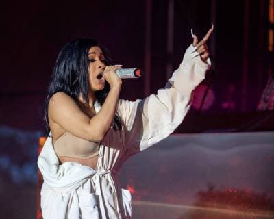 June 16, 2019 - Manchester, Tennessee, U.S - CARDI B changes into a bath robe to complete her performance during the Bonnaroo Music + Arts Festival in Manchester, Tennessee Manchester U.S. - ZUMAs135 20190616_zap_s135_033 Copyright: xDanielxDeSloverx