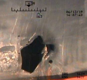 June 13, 2019 - Gilf of Oman - Imagery taken from a U.S. Navy MH-60R helicopter of blast damage to M T Kokuka Courageous. M V Kokuka Courageous received damage consistent with a limpet mine attack in the Gulf of Oman, June 13, 2019 Gilf of Oman - ZUMAz03_ 20190613_sha_z03_288 Copyright: xDoDx
