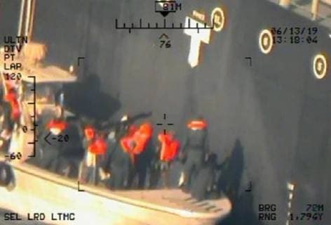 June 13, 2019 - Gilf of Oman - Imagery taken from a U.S. Navy MH-60R helicopter of the Islamic Revolutionary Guard Corps Navy removing an unexploded limpet mine from the M T Kokuka Courageous. Gilf of Oman - ZUMAz03_ 20190613_sha_z03_291 Copyright: xDoDx