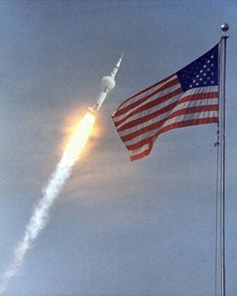 June16, 1969 - Kennedy Space Center, Florida, U.S. - The American flag heralded the launch of Apollo 11, the first Lunar landing mission, on July 16, 1969. The massive Saturn V rocket lifted off from s Kennedy Space Center with astronauts Neil A. Armstrong, Michael Collins, and Edwin Buzz Aldrin at 9:32 a.m. EDT. Four days later, on July 20, Armstrong and Aldrin landed on the Moon s surface Kennedy Space Center U.S. - ZUMAz03_ 19690616_sha_z03_336 Copyright: xNASAx