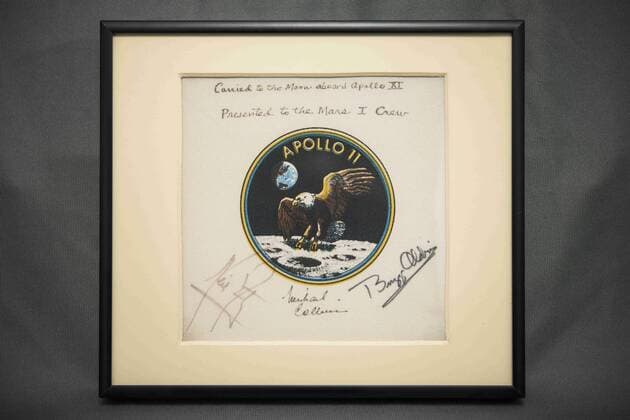 July 11, 2014 - Washington, District of Columbia, U.S. - This framed Apollo 11 mission patch was presented to NASA s Kennedy Space Center during the July 21, 2014, when the center s Operations and Checkout Building was renamed the Neil Armstrong Operations and Checkout Building. The patch was flown aboard Apollo 11 in 1969. In 1987, all three crewmembers Neil Armstrong, Buzz Aldrin and Michael Collins signed the patch and presented it to former NASA Administrator James C. Fletcher for safekeeping until it could be presented to the first crew to land on Mars Washington U.S. - ZUMAz03_ 20140711_sha_z03_366 Copyright: xJoelxKowskyx