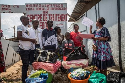 June 12, 2019 - Beni, Democratic Republic of Congo - Prince, 8, is handed a certificate confirming he is Ebola-free, outside the Ebola treatment centre in Beni, eastern Democratic Republic of the Congo..The DRC is currently experiencing the second worst Ebola outbreak in recorded history. More than 1,400 people have died. Beni Democratic Republic of Congo - ZUMAs197 20190612_zab_s197_048 Copyright: xSallyxHaydenx