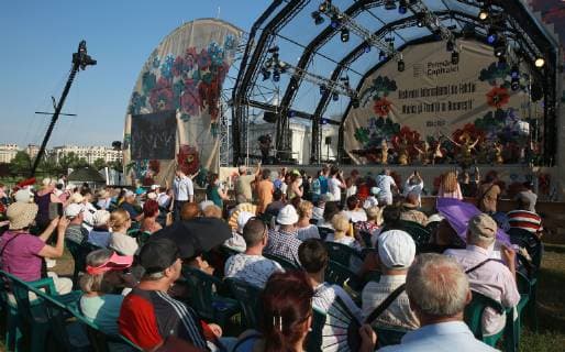 (190624) -- BUCHAREST, June 24, 2019 -- People view the performance during the 13th International Folklore Festival Music and Traditions in Bucharest, Romania, on June 23, 2019. The three-day folklore festival concluded on Sunday. ) ROMANIA-BUCHAREST-FOLKLORE FESTIVAL GabrielxPetrescu 