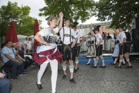 Muenchen, festival of brass music in the beer garden on the Viktualienmarkt with the traditional costume group of the Chiemgauer Alpenverband at the dance