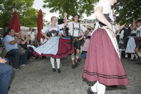 Muenchen, festival of brass music in the beer garden on the Viktualienmarkt with the traditional costume group of the Chiemgauer Alpenverband at the dance