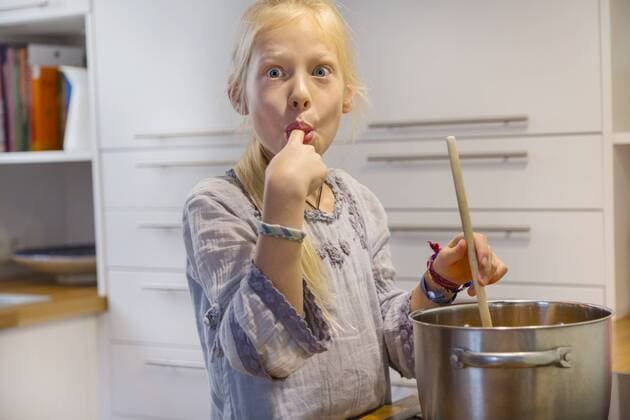 Portrait of girl cooking jam at home model released Symbolfoto property released  HSIF00524