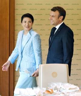French president at Imperial Palace in Japan Japanese Empress Masako accompanies French President Emmanuel Macron to a luncheon at the Imperial Palace in Tokyo on June 27, 2019. (Pool photo) 
