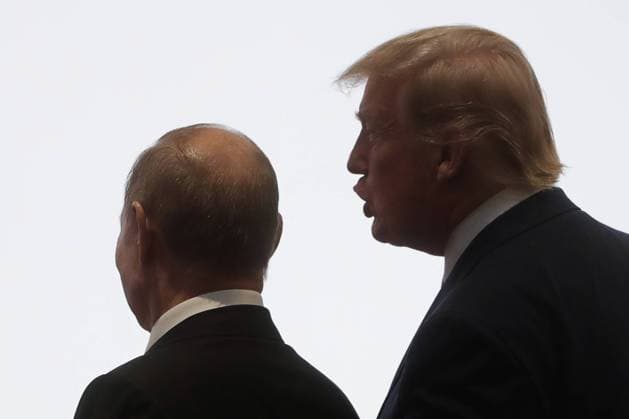 OSAKA, JAPAN - JUNE 28, 2019: Russia s President Vladimir Putin (L) and US President Donald Trump pose at an official meeting ceremony for the heads of delegations from the G20 member countries, invited guests and international organisations participating in the 2019 G20 Summit at the INTEX Osaka International Exhibition Centre. Mikhail Metzel TASS  TS0B1440