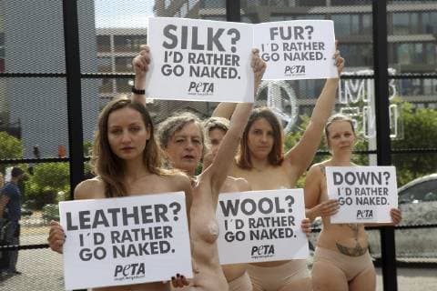Only dressed in underwear and with protest signs in front of their partly naked breas Copyright: epd-bildx xJuergenxBlume EDITORIAL USE ONLY