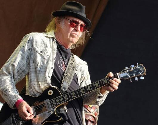 Bob Dylan and Neil Young at Hyde park, London, UK . Neil Young at the AEG presents Bob Dylan and Neil Young at Hyde park,London on 12th July 2019 12 July 2019. LMK73-3006MB-130719 WWW.LMKMEDIA.COM 