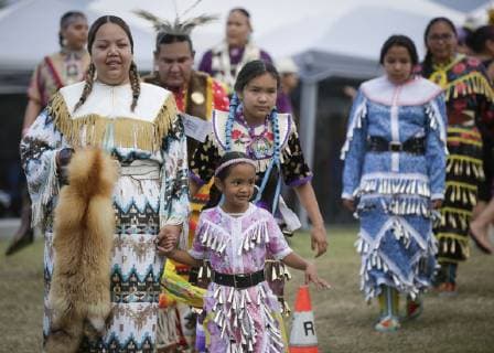 (190715) -- VANCOUVER, July 15, 2019 (Xinhua) -- People dressed in regalia are seen during the 32nd annual Squamish Nation Youth Pow Wow at Capilano Reserve Park in west Vancouver, Canada, July 14, 2019. First Nations people from Canada and the U.S. took part in the 32nd annual Squamish Nation Youth Pow Wow in celebration of indigenous cultures. Pow Wow is an indigenous cultural activity in which people socialize together via different activities like dancing, singing, and honouring the traditions of their ancestors. (Xinhua Liang Sen) CANADA-VANCOUVER-SQUAMISH NATION YOUTH POW WOW 