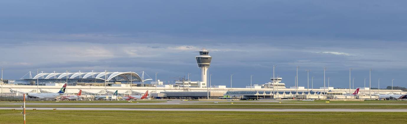 Panoramic view of Terminal 1 and the tower of Munich Airport In the foreground the northern runway Panoramic view of Terminal 1 and the tower of Munich Airport In the foreground the northern runway Panoramic view of Terminal 1 and the tower of Munich Airport In the foreground the northern runway Panoramic view of Terminal 1 and the tower of Munich Airport In the foreground the northern runway  1098000532