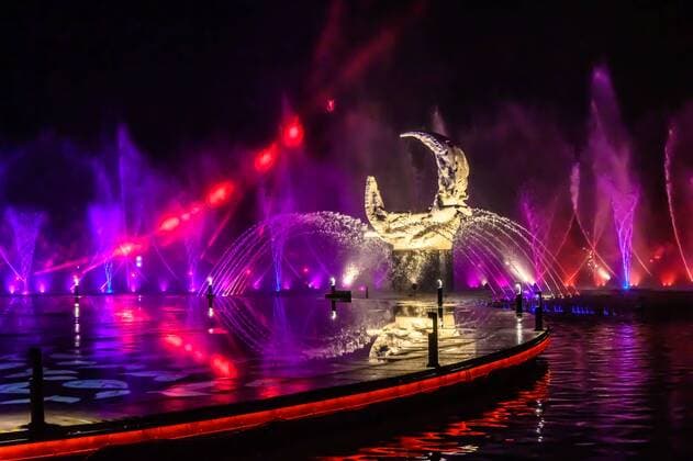 July 19, 2019 - Jilin, Jilin, China - Jilin, CHINA-The musical fountain lighting show in Jingyuetan national forest park in Changchun, capital of northeast China s Jilin province, opens on July 1, 2019.Music fountain waterscape light show is located in the goddess square at the main entrance of jingyuetan, taking the statue of the goddess of the clear moon as the central point, composed of fountain, LED beam light, LED full color tree light, LED full color wash wall light, pattern light, etc., which can combine hundreds of action forms. Jilin China - ZUMAs145 20190719_zaa_s145_080 Copyright: xChixXiaoweix