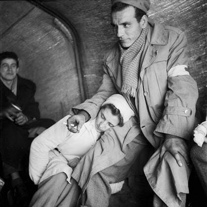 HUNGARY 1956 Red Cross workers rest pm tjeor wau bacl to Aistria after helping victims during the nationwide revolution against the Hungarian People s Republic and its Soviet-imposed policies, lasting from 23 October until 10 November 1956. BUDAPEST HUNGARY x3010x *** HUNGARY 1956 Red Cross workers rest pm tjeor wau bacl to Aistria after helping victims during the nationwide revolution against the Hungarian People s Republic and its Soviet imposed policies, lasting from 23 October until 10 November 1956 BUDAPEST HUNGARY x3010x,  Copyright: xAndersxEngman TTx HUNGARIAN UPRISING 1956