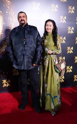 BAKU, AZERBAIJAN - JULY 25, 2019: Hollywood actor Steven Seagal with his wife Erdenetuya at the 2019 Zhara music festival. Vyacheslav Prokofyev TASS  TS0B44B8