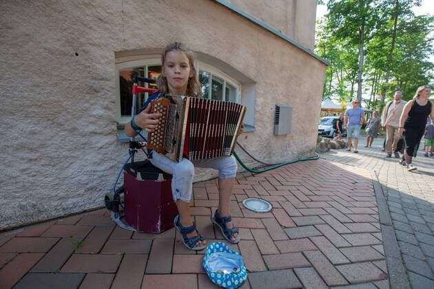 Viljandi, 25.07.2019 First day of the Viljandi Folk Music Festival, people at the festival. The festival takes place every July in the castle park and centre of Viljandi. It is the strongest expression of a special mindset originating from the early 1990s. This mindset values tradition, heritage, and a local identity and tries to adapt the spiritual values collected over hundreds and thousands of years with the modern way of living all of this to keep the traditions alive and thereby strengthen our national characteristics. Viljandi Folk Music Festival has become one of the largest festivals of this kind in the Baltic and Nordic countries over the years. Viljandi Estonia  Copyright: xElmoxRiigx