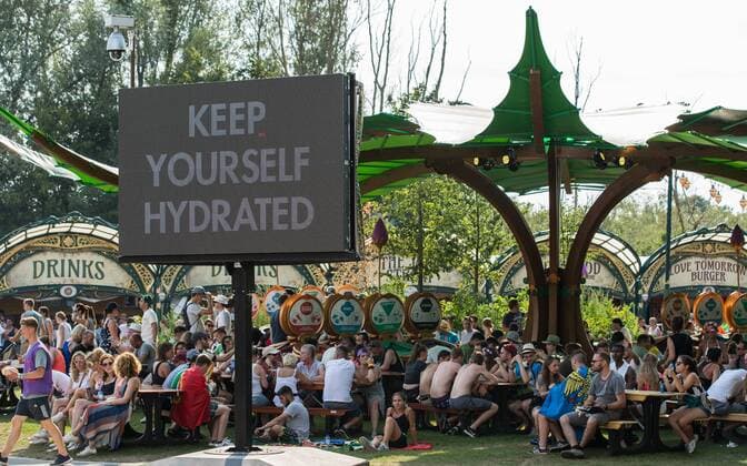 Heat warnings on the led-screens during the first day of the second weekend of the Tomorrowland music festival, Friday 26 July 2019. The 15th edition of Tomorrowland electronic music festival takes place at the De Schorre terrain in Boom from 19 to 21 July 2019 and from 26 to 28 July 2019.  DAVIDxPINTENS 05633902