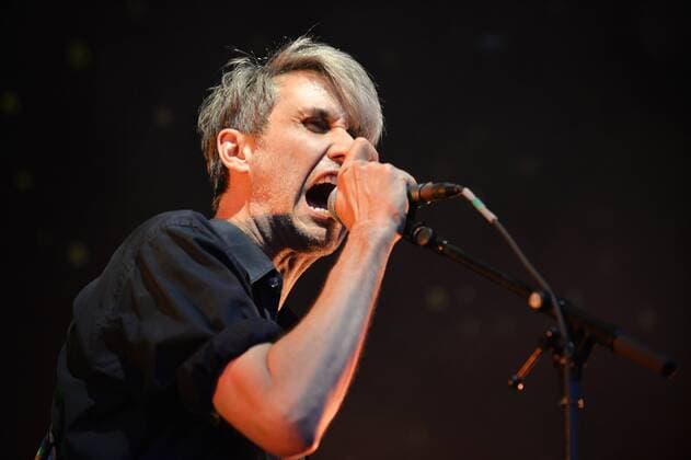 Music festival Heimspiel Knyphausen 26 28 July 2019 , concert of the band Tocotronic on 26 July 2019 Dirk von Lotzow, singer of the band Tocotronic at the microphone at the music festival Heimspiel Knyphausen 2019 Eltville am Rhein Hessen Germany Draiser Hof