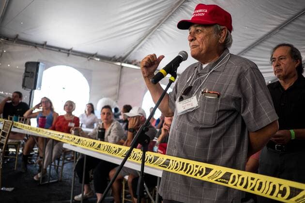 July 27, 2019, Sunland Park, New Mexico, USA: RAY BACA, Chairman of El Paso Hispanics for Trump, asks questions during a presentation at the Symposium at The Wall event next to the privately-funded fence along the U.S.-Mexico border in Sunland Park, New Mexico. Sunland Park USA - ZUMAj106 20190727_zap_j106_007 Copyright: xJoelxAngelxJuarezx