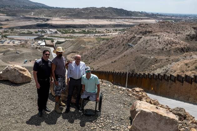 July 27, 2019, Sunland Park, New Mexico, USA: TOMMY FISHER, president and CEO of Fisher Sand and Gravel Co., left, former Milwaukee County Sheriff DAVID ALEXANDER CLARKE JR., Congressman LOUIE GOHMERT (R-Texas) and BRIAN KOLFAGE, founder of We Build the Wall, gather at the top of a hill next to a completed portion of a privately-funded fence during the Symposium at The Wall event along the U.S.-Mexico border in Sunland Park, New Mexico. Sunland Park USA - ZUMAj106 20190727_zap_j106_015 Copyright: xJoelxAngelxJuarezx