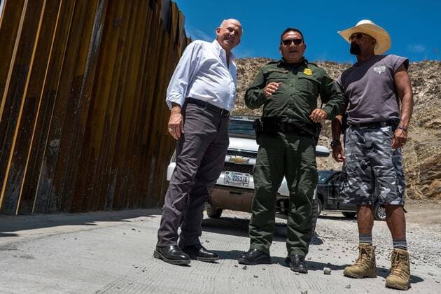 July 27, 2019, Sunland Park, New Mexico, USA: Congressman LOUIE GOHMERT (R-Texas), left, an unidentified U.S. Border Patrol agent, center, and Former Milwaukee County Sheriff DAVID ALEXANDER CLARKE JR., right, stand near the top of a privately-funded fence along the U.S.-Mexico border during the Symposium at The Wall event in Sunland Park, New Mexico. Sunland Park USA - ZUMAj106 20190727_zap_j106_019 Copyright: xJoelxAngelxJuarezx