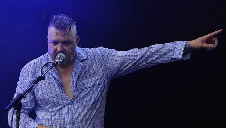 Music festival Heimspiel Knyphausen 26 28 July 2019 , concert of the band Fortuna Ehrenfeld on 28 July 2019 Martin Bechler, singer of the band Fortuna Ehrenfeld, at the music festival Heimspiel Knyphausen 2019 Bechler points his finger to the left Eltville am Rhein Hessen Germany Draiser Hof