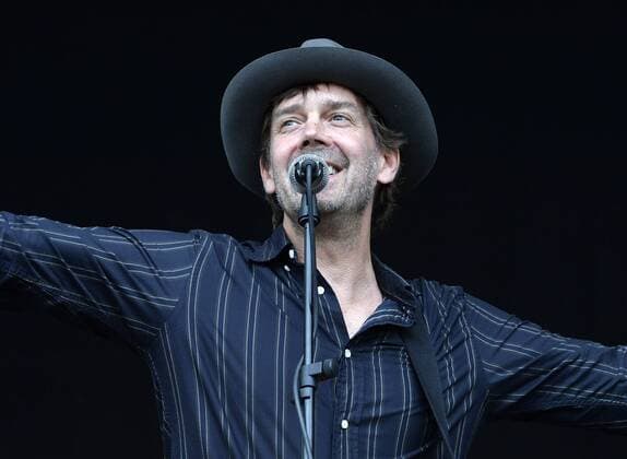 Music Festival Heimspiel Knyphausen 26 28 July 2019 , Concert by Niels Frevert and band on 28 July 2019 Niels Frevert Mitte and band at the Music Festival Heimspiel Knyphausen 2019 Frevert spreads his arms and laughs Eltville am Rhein Hessen Germany Draiser Hof