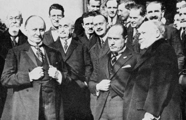 First meeting of the Allied Representatives at the Lausanne Conference First meeting of the Allied Representatives at the Lausanne Conference, which met in November 1922, to make peace with Turkey.Left to right front row: Lord Curzon, Benito Mussolini and Raymond Poincare Copyright: xPhoto12 AnnxRonanxPicturexLibraryx ARP07093390000073