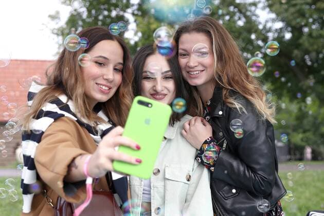 MOSCOW, RUSSIA - AUGUST 3, 2019: People make a selfie at the 2019 Afisha Picnic music festival at Moscow s Kolomenskoye Museum-Reserve. Anton Novoderezhkin TASS  TS0B554B