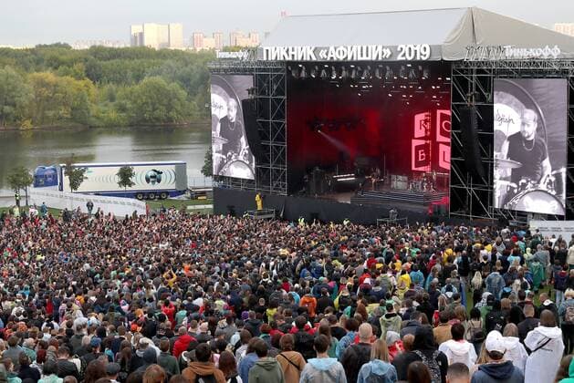 MOSCOW, RUSSIA - AUGUST 3, 2019: People attend a concert by the English rock band The Cure at the 2019 Afisha Picnic music festival at Moscow s Kolomenskoye Museum-Reserve. Anton Novoderezhkin TASS  TS0B5602