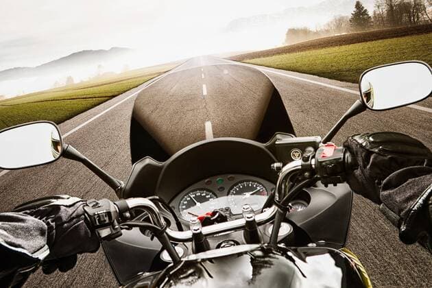  motorcycling from the perspective of the driver ,model released, Symbolfoto  Copyright: xsteinerpicturex Panthermedia20907483