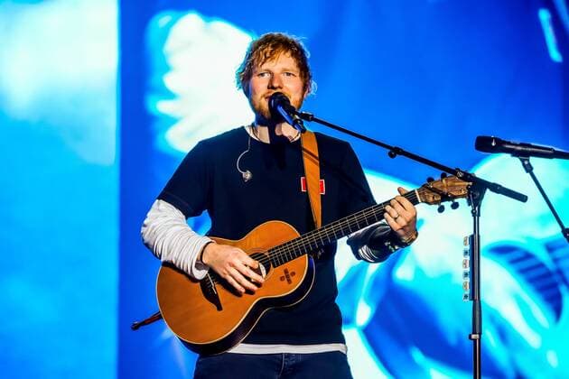 Hungary: Ed Sheeran performs on stage Edward Christopher Sheeran, English singer, songwriter, guitarist, record producer, and actor, performs during the first day of Sziget Festival in Budapest. His concert is the biggest sold out in the whole history of this festival. Budapest Hungary Sziget Festival  LuigixRizzo
