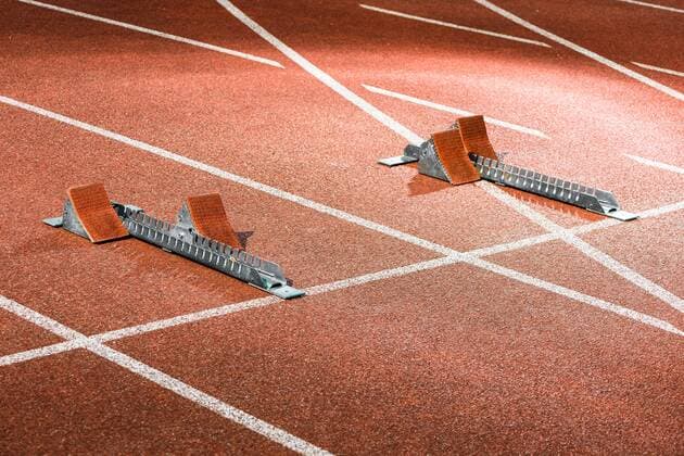  Starrting blocks at cindertrack of athletics stadium ,model released, Symbolfoto  Copyright: xKzenonx Panthermedia25859764